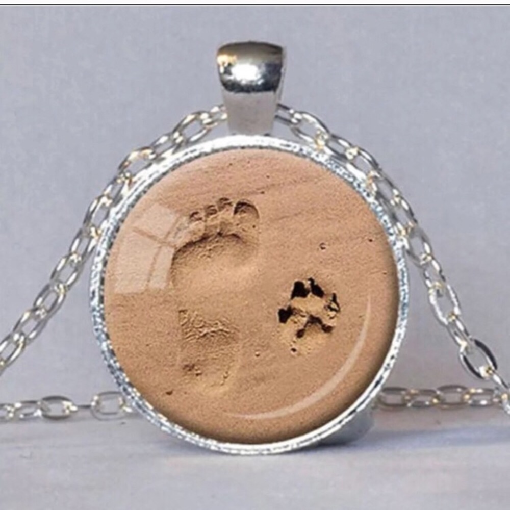 New foot print and paw print in sand necklace